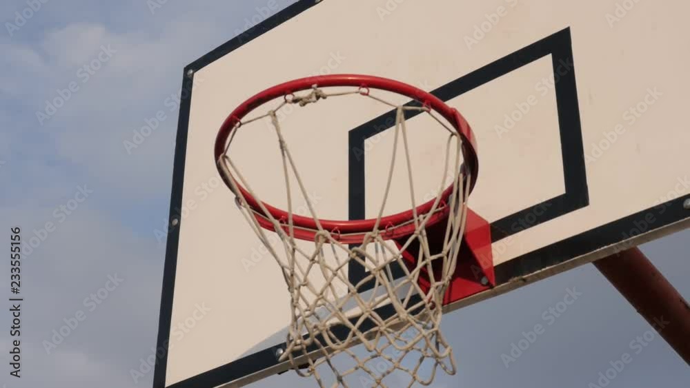 Close-up of basketball hoop with backboard slow-mo footage Close-up of basketball hoop with backboard slow-mo footage