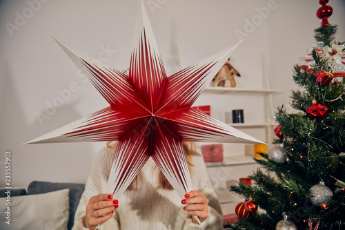 Woman preparing decoration for Christmas / New Year's eve.