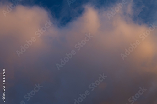 clouds illuminated by the setting sun, shot in late autumn