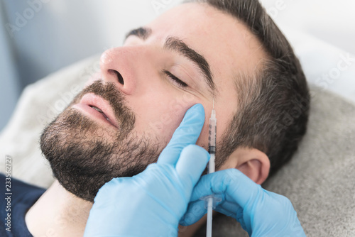 Man having facial procedure