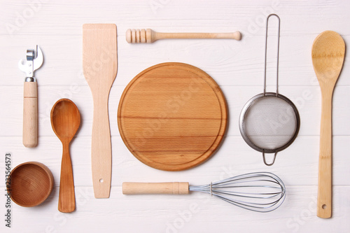 different kitchenware on a light background top view. Cooking appliances. flat lay 