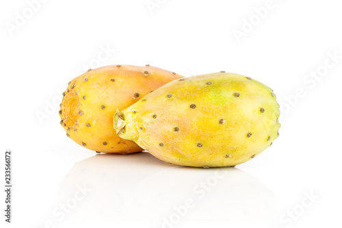 Group of two whole yellow orange fresh bright prickly pear opuntia isolated on white background