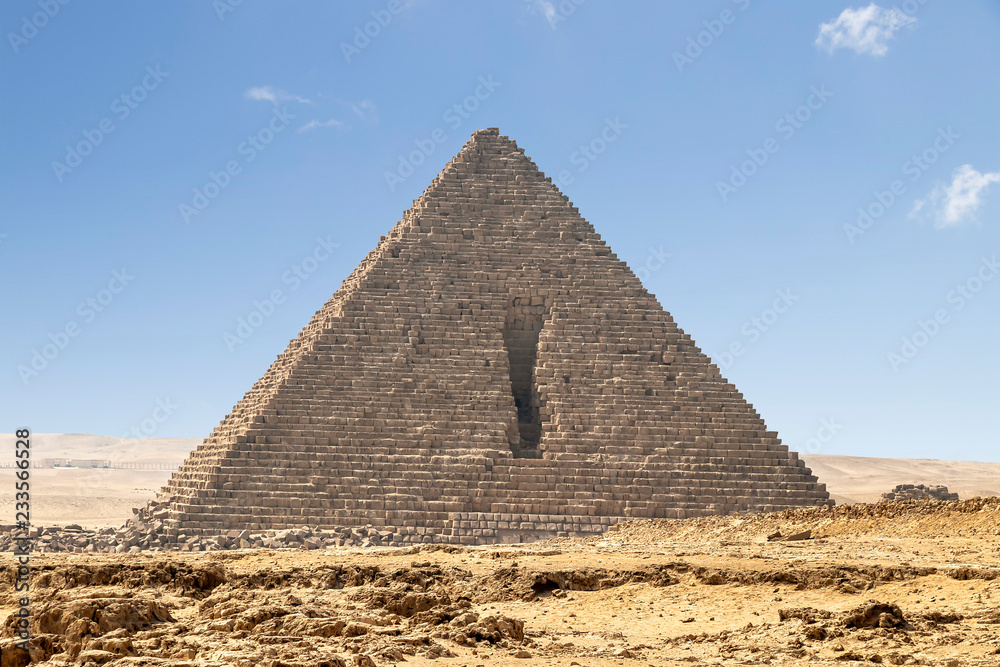The Pyramid of Menkaure is the smallest of the three main Pyramids of Giza, located on the Giza Plateau in the southwestern outskirts of Cairo, Egypt. The Pyramid of Menkaure is the smallest of the three main Pyramids of Giza, located on the Giza Plateau in the southwestern outskirts of Cairo, Egypt.