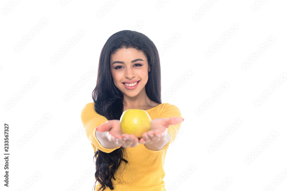 beautiful young african american woman holding apple and smiling at camera isolated on white beautiful young african american woman holding apple and smiling at camera isolated on white