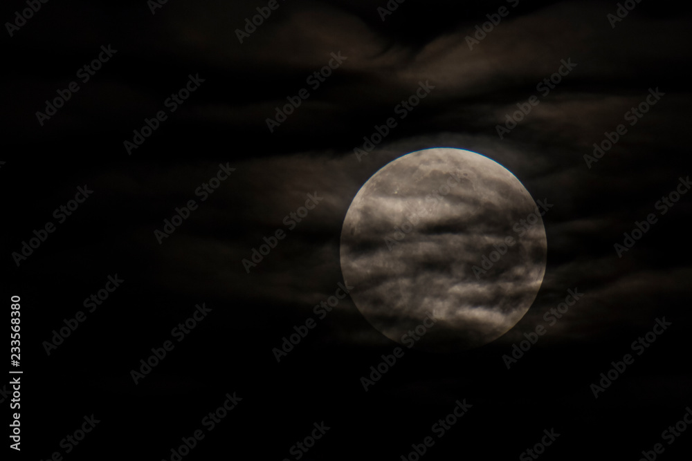 Fototapeta premium Moon and clouds in Manresa, Catalonia, Spain