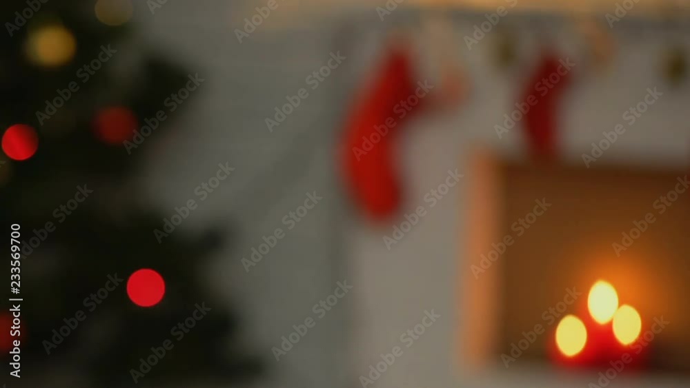 Woman taking Christmas cupcakes to festive table, sweet treats for guests Woman taking Christmas cupcakes to festive table, sweet treats for guests