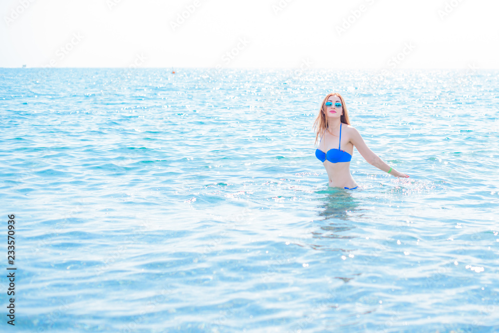 Woman rest and having fun at sea. Good mood on vacation, warm weather and happy tourist 
