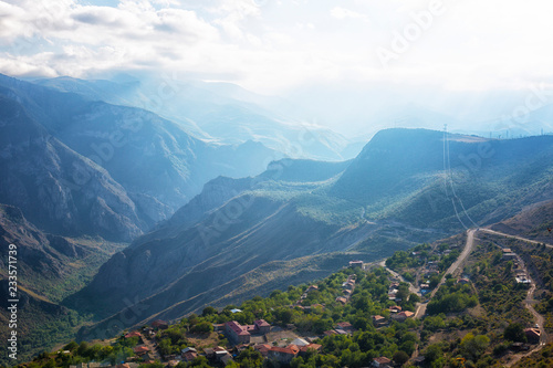 Beautiful top view of the mountains  the village and the highway going among the mountains  Armenia  Tatev.