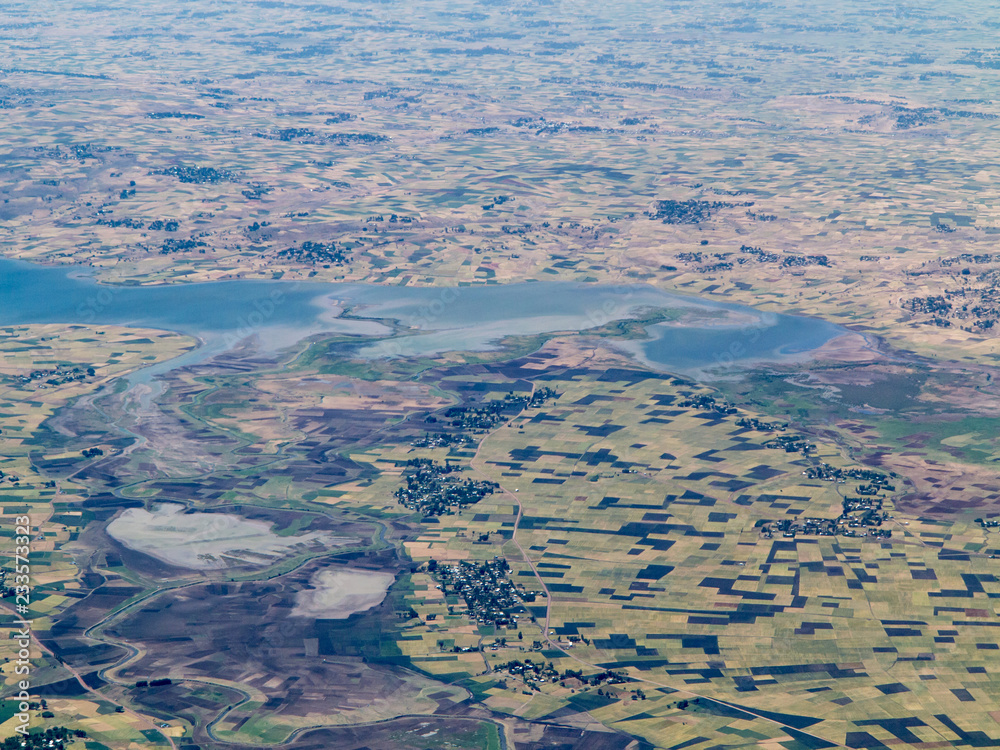 High aerial shot of farms and lake in Ethiopia near Addis Ababa.