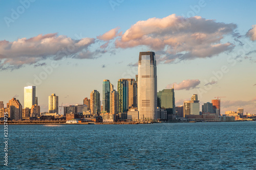 Jersey City from Hudson river during sunset in Jersey City, NJ, USA