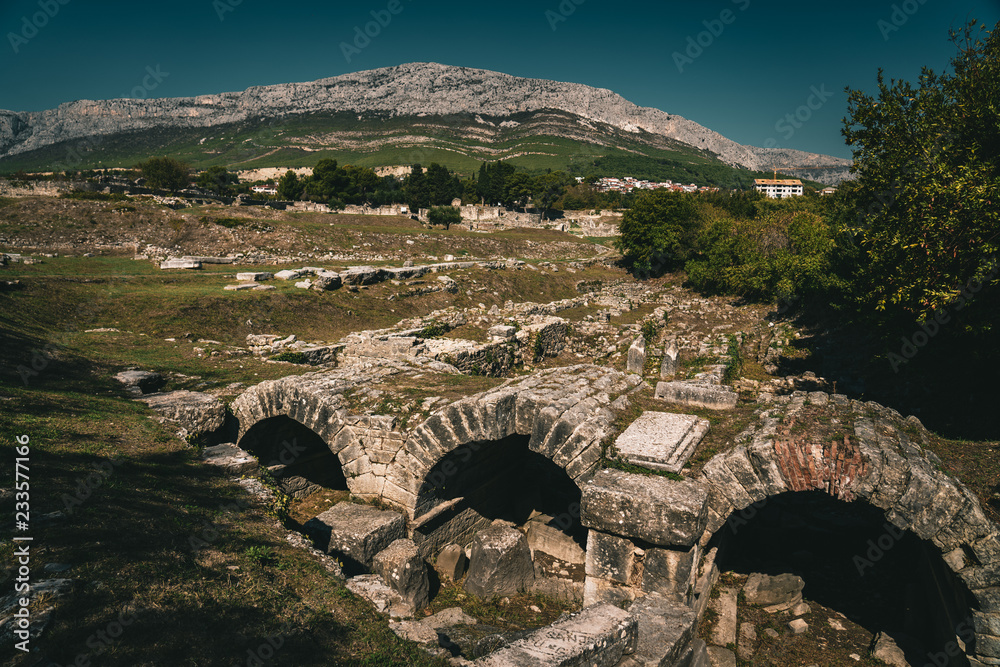 mountains over roman ruins