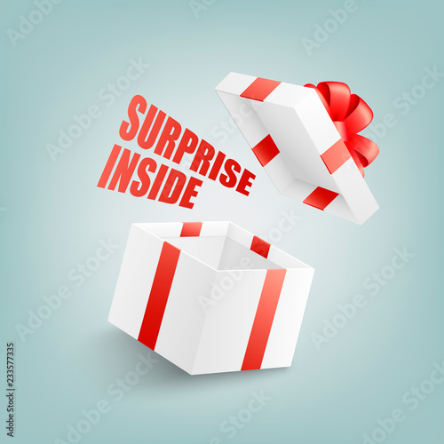 Open white gift box with red ribbon and bow, flying cover and sign Surprise Inside in realistic 3d style isolated on blue background - greeting present package in vector illustration.