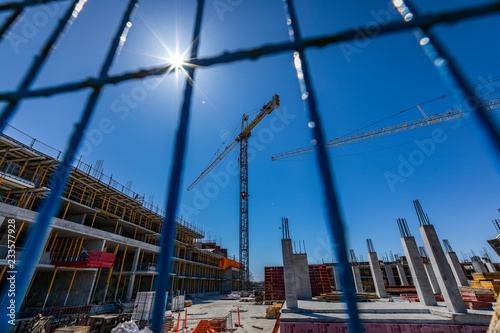Construction site crane and sunny sky