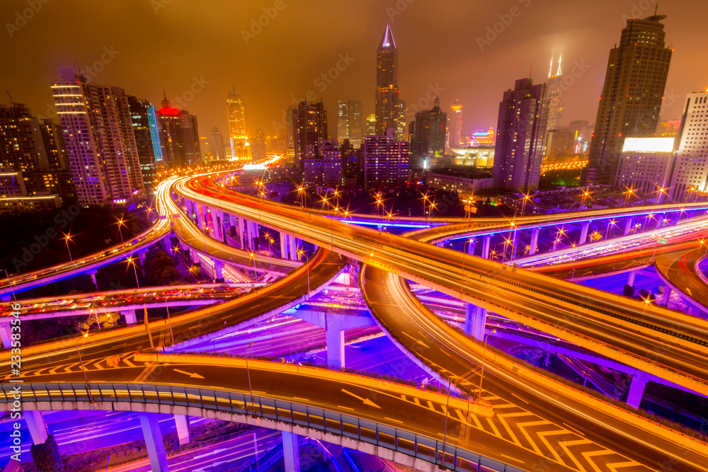 Fototapeta premium Traffic tracks in the downtown area of Shanghai at night