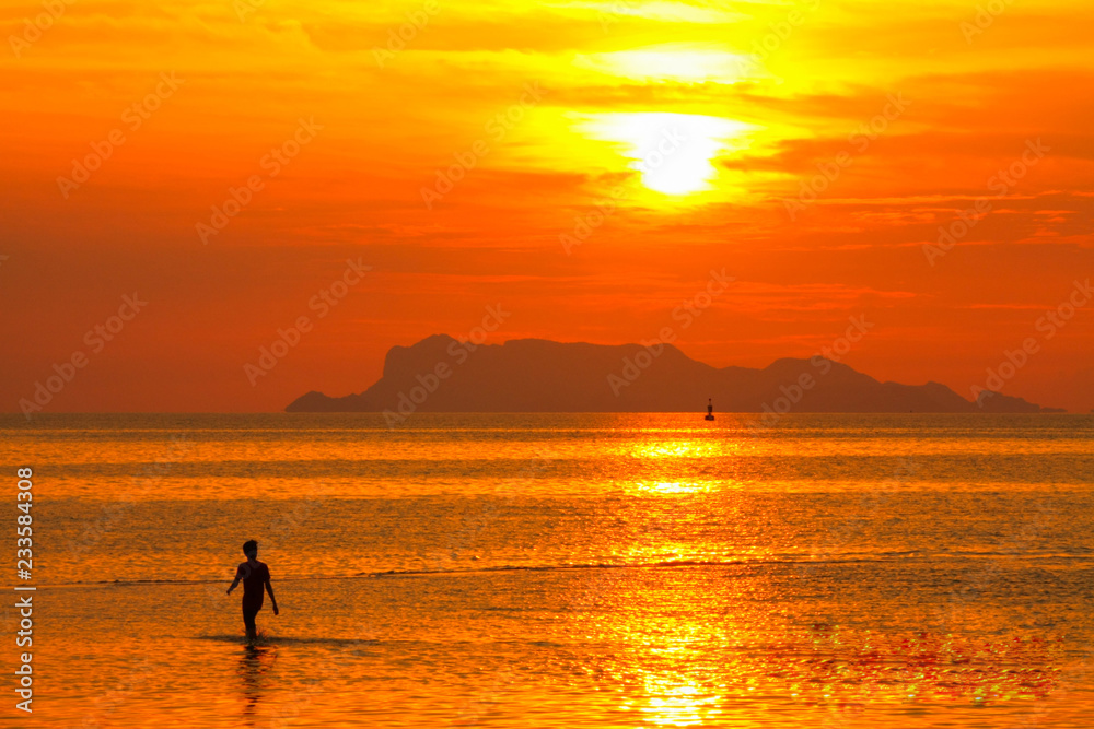 silhouette of fisherman at sunset silhouette of fisherman at sunset