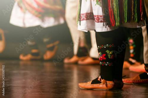 Young Serbian dancers in traditional costume. Folklore of Serbia