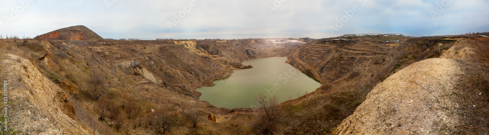 The abandoned coal mine, the village of Krasnogorsk. Panorama in cloudy weather