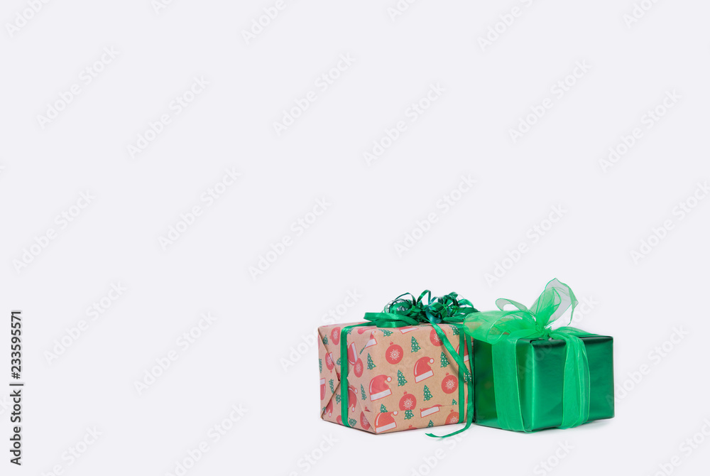 Obraz premium Christmas gift boxes on white background. Xmas. family holiday concept. Merry Christmas and Happy Holidays.