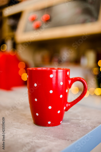 Amazing red cup is on the table