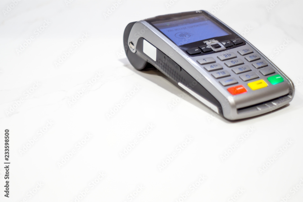 Credit card reader on white background with space for copy Credit card reader on white background with space for copy