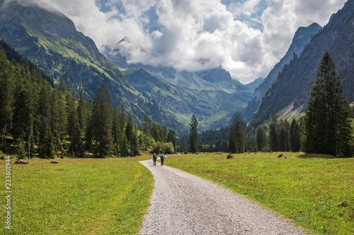 Hikers in the Oytal, near Oberstdorf, Allgau Alps, Oberallgau, Allgau, Bavaria, Germany, Europe photo