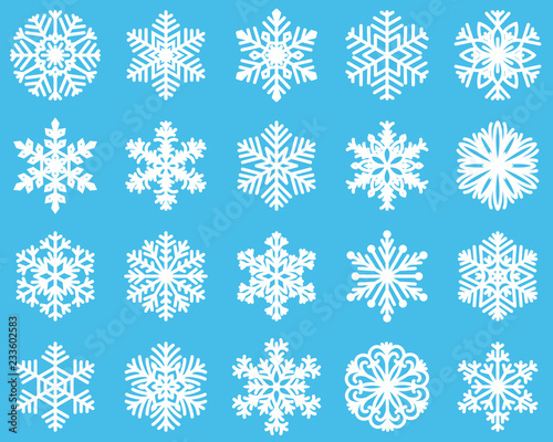 Paper snowflake set, isolated on blue background.