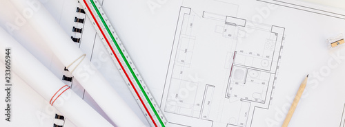 Interior designer table workplace with house plan