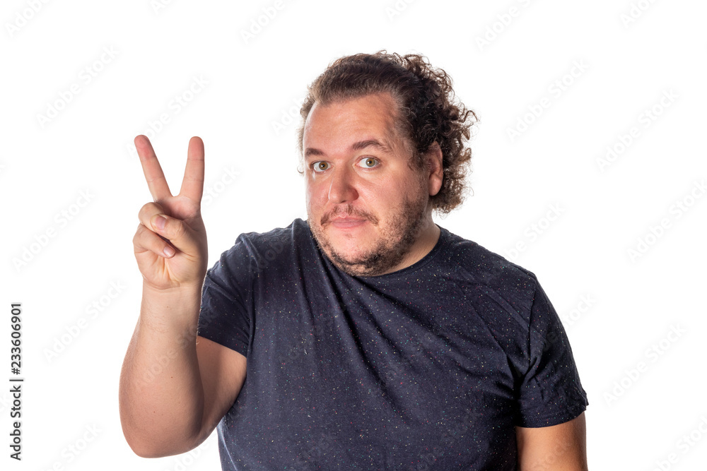 Portrait of funny fat man showing peace v-sign or victory gesture on white background Portrait of funny fat man showing peace v-sign or victory gesture on white background