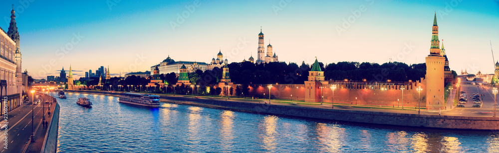 Naklejka premium Moscow Kremlin, Kremlin Embankment and Moscow River at night in Moscow, Russia. Architecture and landmark of Moscow