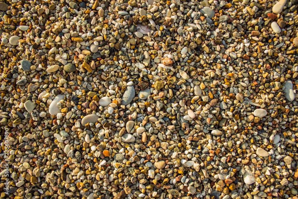 colorful yellow small stones background texture from sea shore waterfront district colorful yellow small stones background texture from sea shore waterfront district