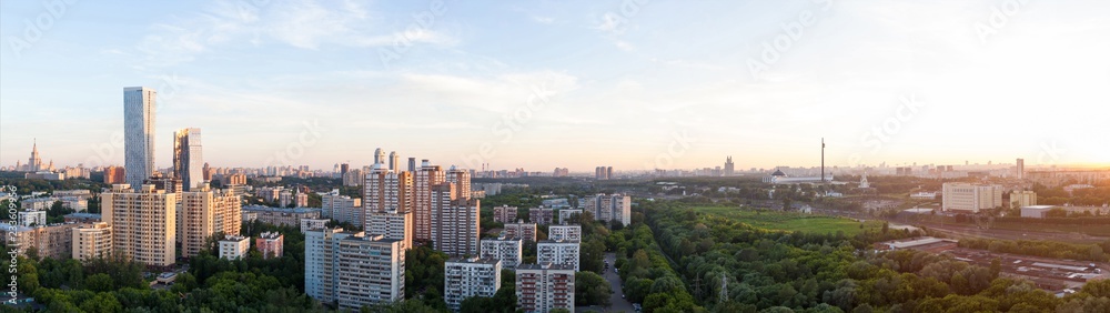 panorama (aerial view) of the city Moscow at the summer on a during sunset with clouds