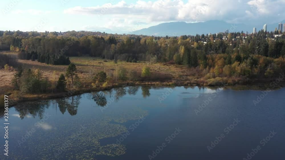 Beautiful mountain and forest lake in Vancouver, British Columbia, Canada. Drone flying aerial view. 4k. Beautiful mountain and forest lake in Vancouver, British Columbia, Canada. Drone flying aerial view. 4k.