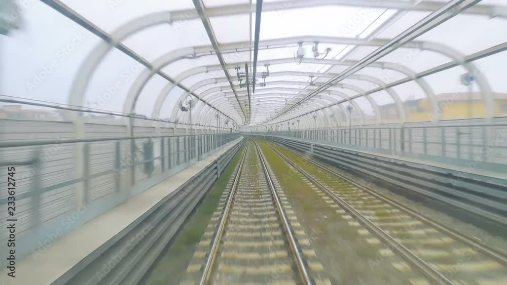Rapid transit on a modern train. City trip around the city using train on high speed rails Rapid transit on a modern train. City trip around the city using train on high speed rails