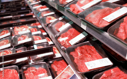 Showcase meat products in a supermarket photo