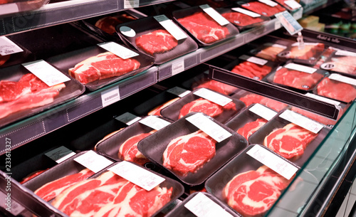 Konstfotografi Showcase beef steaks meat products in a supermarket
