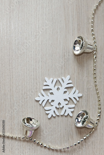  Christmas snowflake and bells on wooden background
