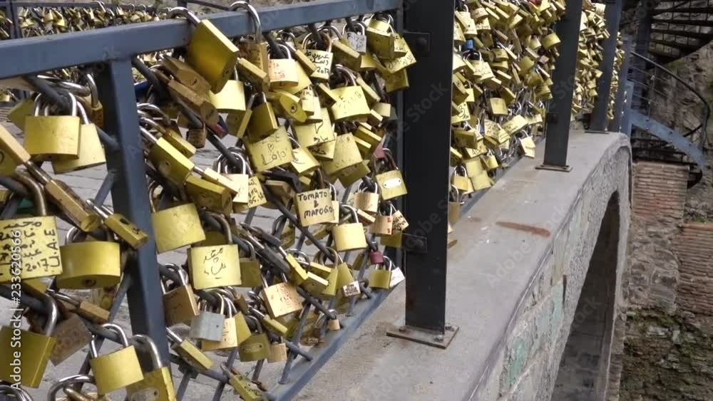 Gold color locks on the bridge of love