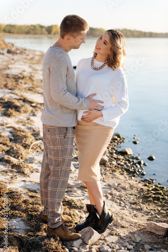 Young family thrillingly waiting for a child photo