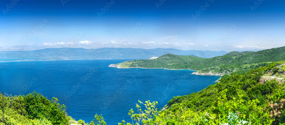 Wonderful romantic summer afternoon landscape panorama coastline Adriatic sea. The magical clear transparent azure water in the bay. Krk island. Croatia. Europe.