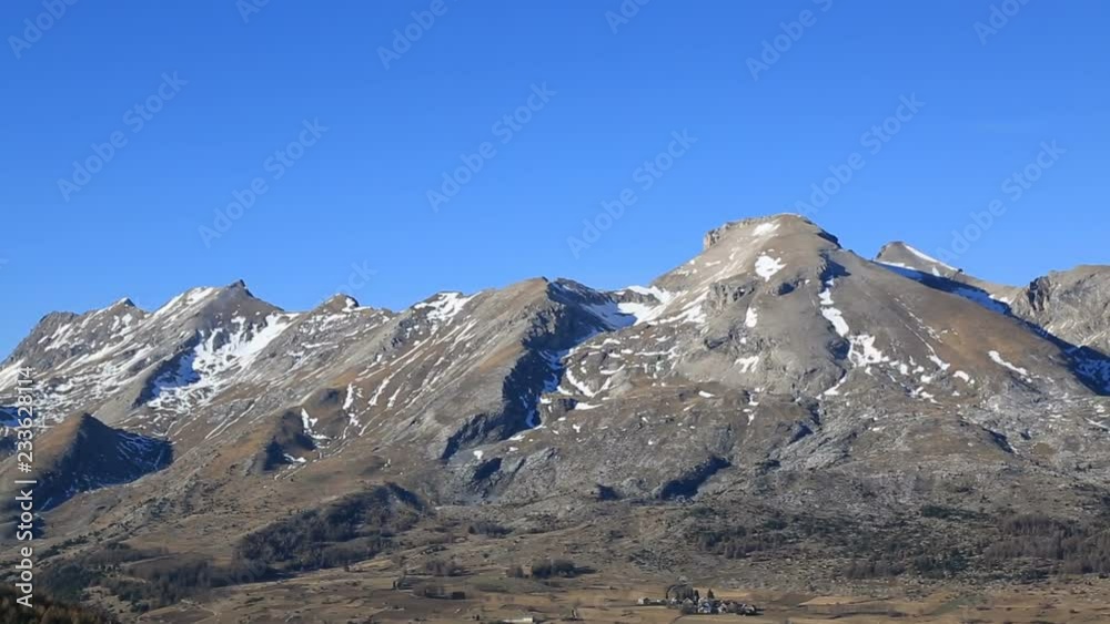 Panorama of peaks from Devoluy Massif during a winter without snow. Panorama of peaks from Devoluy Massif during a winter without snow.