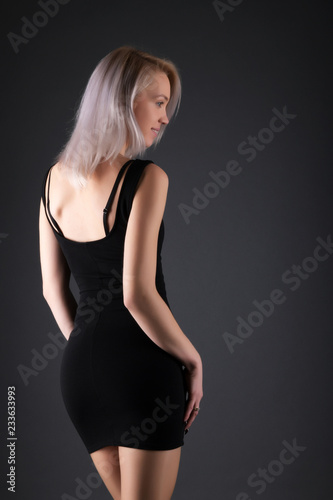 Elegant blonde on black background