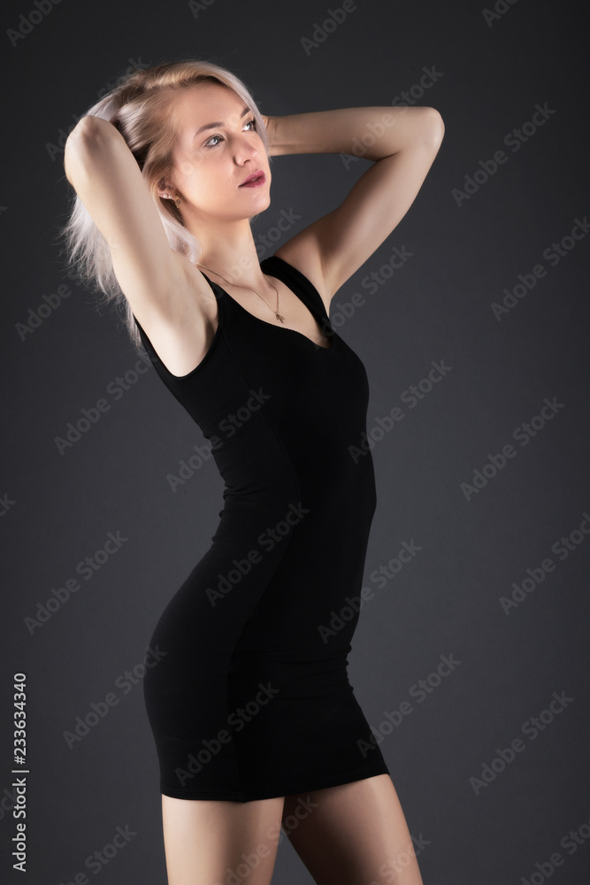 Elegant blonde on black background Elegant blonde on black background