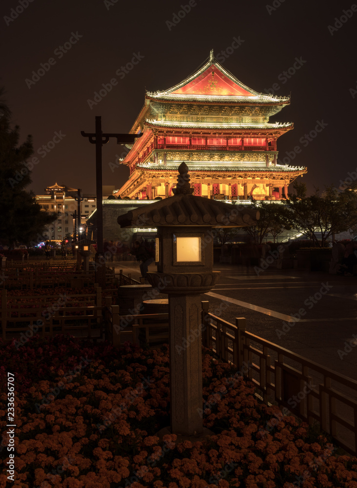 Fototapeta premium Illuminated Bell tower in Xian, China at night