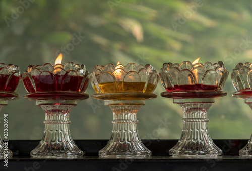 Votive candles in glass dishes at Wild Goose Pagoda