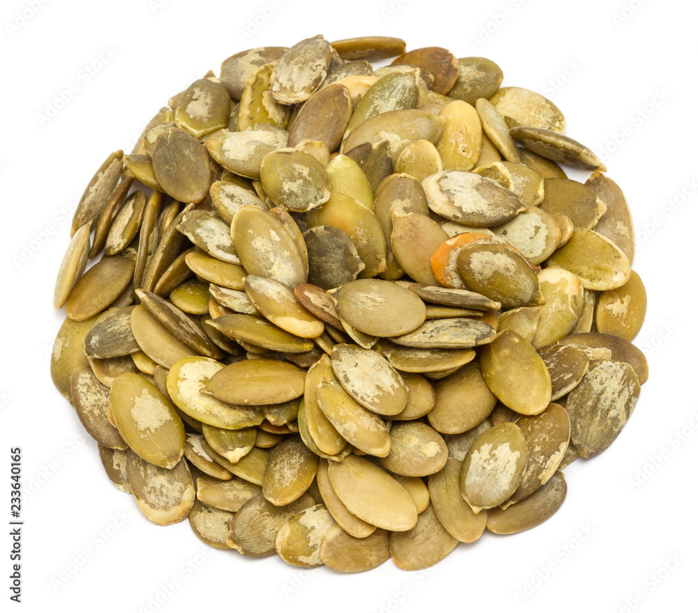 Handful of pumpkin seeds without shell, close up, isolated on white background Handful of pumpkin seeds without shell, close up, isolated on white background