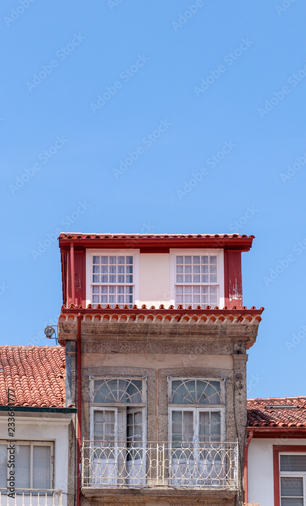 traditional house with red roof