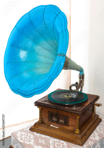Ancient turquoise gramophone on nightstand