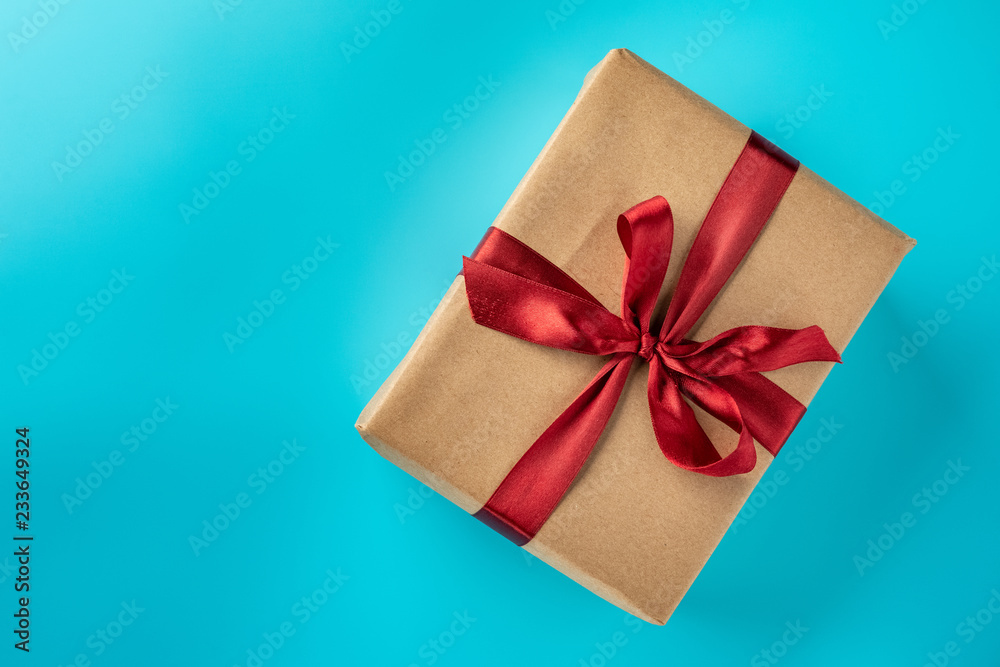Flat lay of gift on blue background Flat lay of gift on blue background