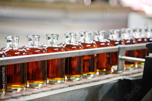 Картината върху платно Whiskey bottles in cider at distillery