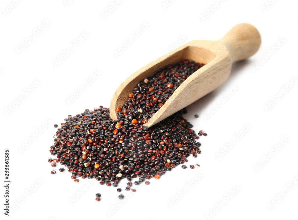 Pile of black quinoa and scoop on white background Pile of black quinoa and scoop on white background